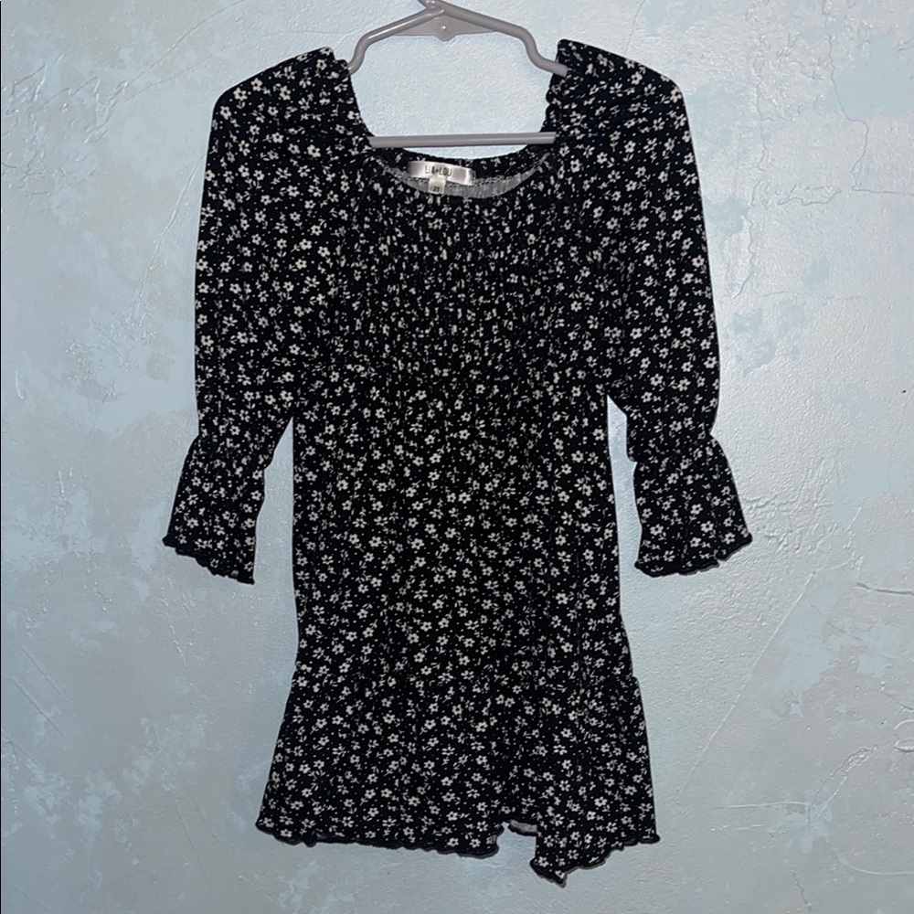 Elegant Black Dress with White Floral Pattern